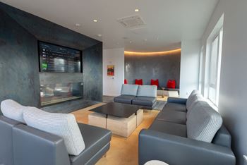 Rooftop club room living area with tv